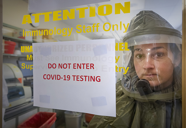 Bethany Peters wears hazmat suit in COVID19 clinic